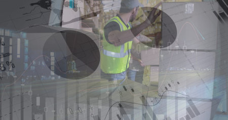 Statistical data processing against caucasian delivery man stacking boxes from warehouse in his van. logistics and transportation business conceptの写真素材