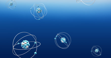 Image of atom models spinning on blue background. Global science, research, connections, computing and data processing concept digitally generated image.の写真素材