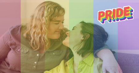 Image of rainbow flag over lesbian couple kissing. lgbt rights and equality concept digitally generated image.の写真素材