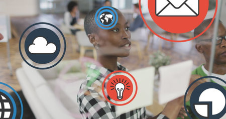 Image of media icons over diverse business people in office. Global business and digital interface...