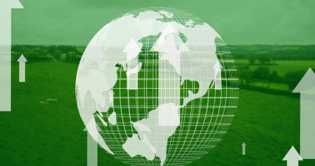 Composition of white arrows over globe and landscape on green background. global connections, digital interface and technology concept digitally generated image.の写真素材