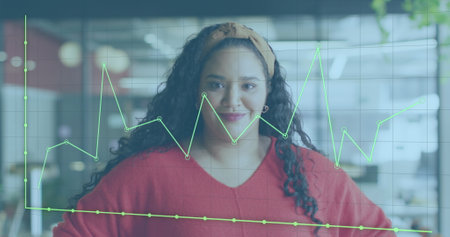Image of financial data processing over biracial businesswoman working at office. Global business,...