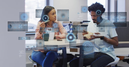 Image of data processing with scope scanning over diverse business people working at office. Global...