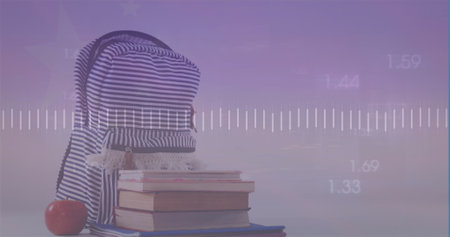 Image of data processing over school items. Global education and digital interface concept digitally generated image.の写真素材