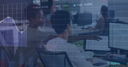 Image of financial data and graphs over diverse female coworkers in office. Business, finance,...