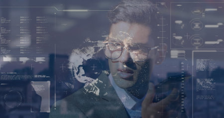 Image of interface with data processing over biracial businessman talking on smartphone. Computer interface and business networking technology conceptの写真素材