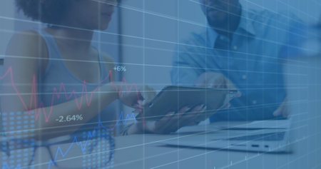 Image of financial data processing over businessman using vr headset. Business partnership and...
