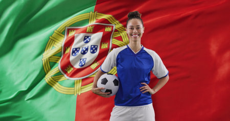 Image of biracial female soccer player over flag of portugal. Global patriotism, celebration, sport and digital interface concept digitally generated image.の写真素材