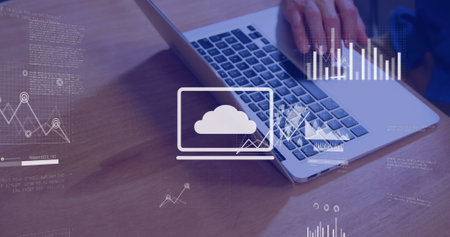 Image of financial data processing over businessmen using laptop. global business, finances, data...