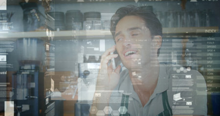 Image of data processing over caucasian businessman talking on smartphone. Global business and...