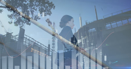 Image of financial data processing over caucasian businesswoman. business, digital interface and data processing concept digitally generated image.の写真素材