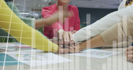 Image of financial data processing over diverse business people having meeting at office. Global business, finances and digital interface concept digitally generated image.の写真素材