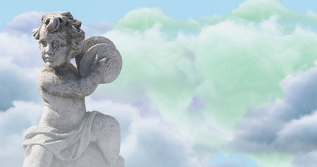 Image of gray sculpture of cupid over blue sky and clouds, copy space. Abstract background, art and statuary concept, digitally generated image.の写真素材
