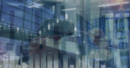 Image of financial data over caucasian woman using vr headset in office. business, finance,...