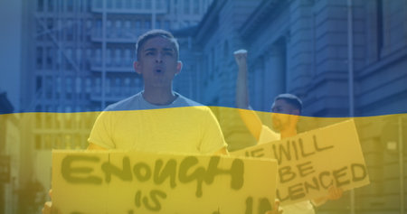 Image of flag of ukraine over biracial male protesters. ukraine crisis and international politics concept digitally generated image.の写真素材