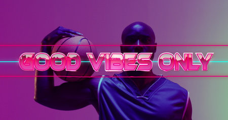 Image of good vibes only text over neon pattern and african american basketball player. Sports, competition, image game and communication concept digitally generated image.の写真素材