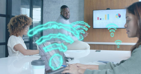 Wi fi icons over biracial casual businesswoman and diverse colleagues at casual meeting. Casual...