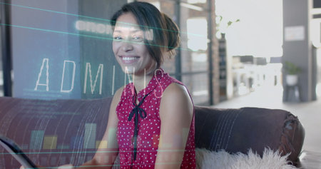 Data and security messages over happy biracial casual businesswoman using laptop. Business,...