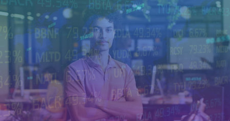 Image of financial data processing over biracial businessman. Global business, finances, computing and data processing concept digitally generated imageの写真素材