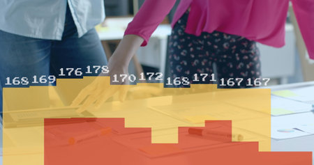 Image of data processing and diagrams over diverse colleagues with blueprints in office. Global business, architecture and digital interface concept digitally generated image.の写真素材