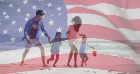 Image of flag of united states of america over biracial couple with children by seaside. American patriotism, diversity and tradition concept digitally generated image.の写真素材