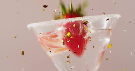 Image of confetti falling and cocktails on white background. Party, drink, entertainment and celebration concept digitally generated image.の写真素材