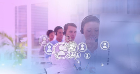 Image of network of digital people icons over team of colleagues with phone headsets in office. global business, finances and networking concept digitally generated image.の写真素材