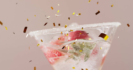 Image of confetti falling and cocktails on white background. Party, drink, entertainment and celebration concept digitally generated image.の写真素材