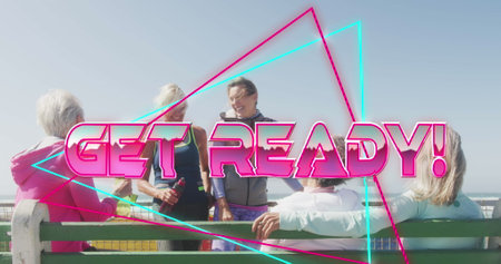 Image of text get ready, in shiny pink, over women talking on beach. positive feelings and wellbeing, retro game screen and social media concept, digitally generated image.の写真素材