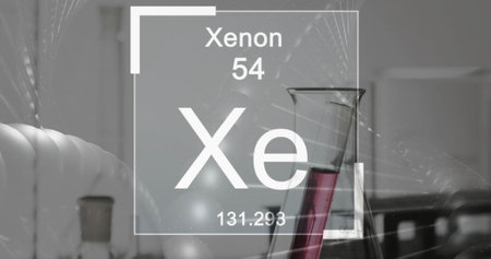 Image of chemical element symbol over laboratory dishes on grey background. Science, research and...