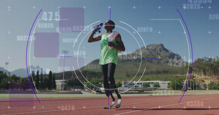 Image of digital data processing over disabled male athlete with running blades drinking water. global sports, competition, disability and digital interface concept digitally generated image.の写真素材