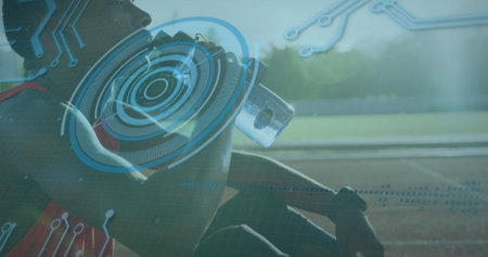 Image of digital data processing over disabled male athlete with running blades on running track. global sports, competition, disability and digital interface concept digitally generated image.の写真素材