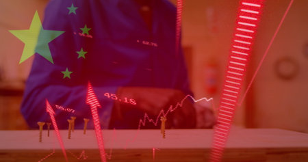 Image of financial data processing, flag of china over male worker in factory. Global business, finance, data processing and global economy concept digitally generated image.の写真素材