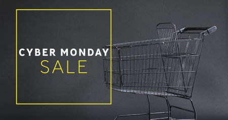 Image of cyber monday sale text over shopping trolley. Sales, retail, cyber shopping, digital interface, communication, computing and data processing concept digitally generated image.の写真素材