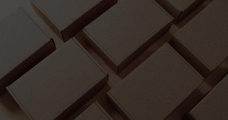 Image of cyber monday text over gift boxes. Sales, retail, cyber shopping, digital interface, communication, computing and data processing concept digitally generated image.の写真素材