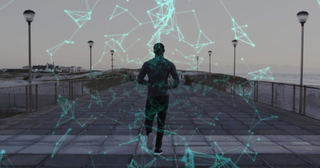Image of network of connections over a running african american man. Global connections, wellbeing,...