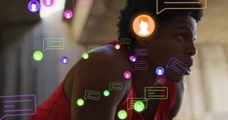 Image of media icons over african american man resting. Global business and digital interface concept digitally generated image.の写真素材