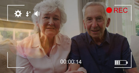 Image of play screen over caucasian senior couple. International day of older persons concept...