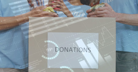 Image of statistics and data processing over smiling volunteers working in warehouse. global data processing, shipping, delivery and connections concept digitally generated image.の写真素材