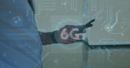 Image of 6g text and glowing computer motherboard over man walking using smartphone. communication technology digital interface concept, digitally generated image.の写真素材