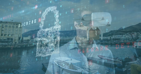 Image of cyberattack warning with caucasian man using vr headset over cityscape. Global technology, online security and digital interface concept digitally generated image.の写真素材