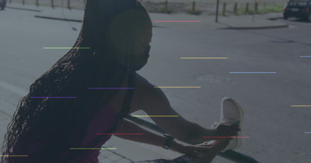 Image of social media icons over african american fit woman stretching her leg. Social media networking technology conceptの写真素材