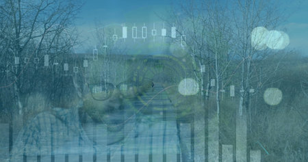 Image of data processing over caucasian businessman and cyclist. Global business and digital interface concept digitally generated image.の写真素材