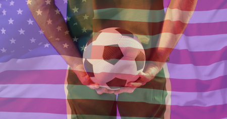 Image of caucasian male soccer player over flag of usa. Global patriotism, celebration, sport and digital interface concept digitally generated image.の写真素材