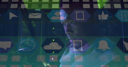 Image of icons over african american male server room worker. Cloud computing concept concept...