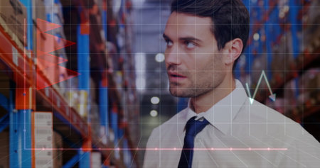 Image of financial data processing and caucasian male worker using tablet in warehouse. Global finances, delivery, shipping, computing and digital interface concept digitally generated image.の写真素材