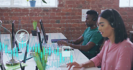 Image of financial data processing over diverse business people in office. Global finance, business, connections, computing and data processing concept digitally generated image.の写真素材