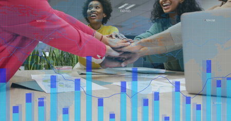 Image of data processing over diverse male and female colleagues hand stacking at casual meeting....