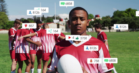 Image of icons and data processing over diverse rugby players. Global sports, competition, connections, computing and data processing concept digitally generated image.の写真素材