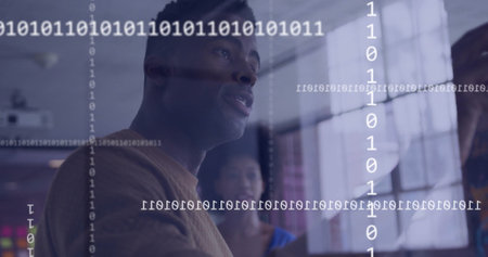 Image of binary coding over diverse colleagues discussing work in office. Global business, teamwork and digital interface concept digitally generated image.の写真素材